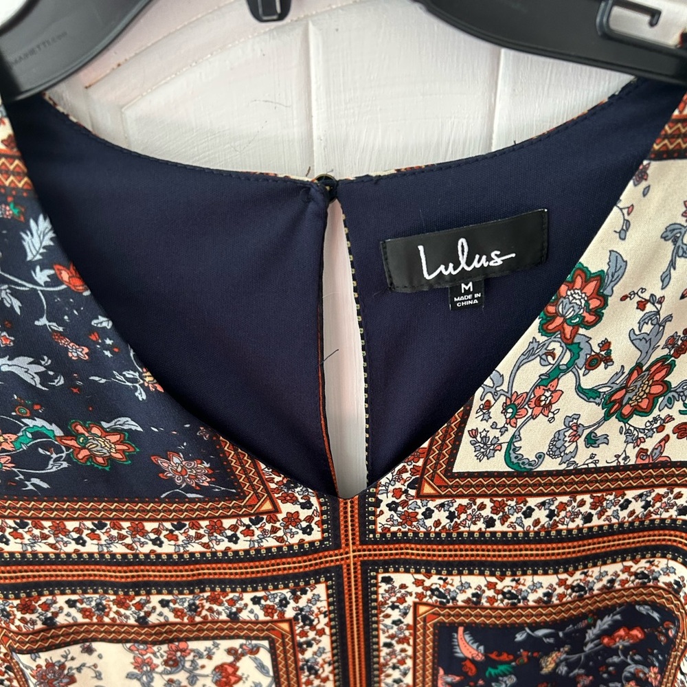 NWOT Lulu's Navy and Cream Lined Pattern Dress w/Bell Sleeves and Ruffle Bottom - Picture 3 of 15